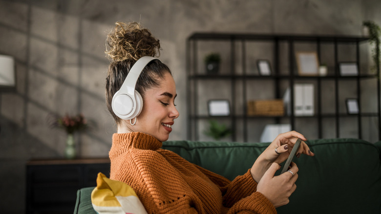 Woman listening to music with headphones