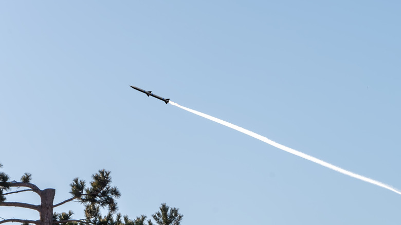 Missile streaking across the sky