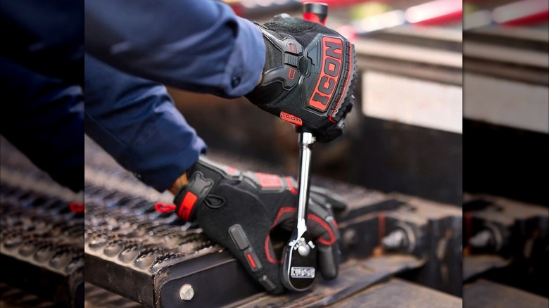 Wearing the Harbor Freight Icon gloves while using a ratchet.