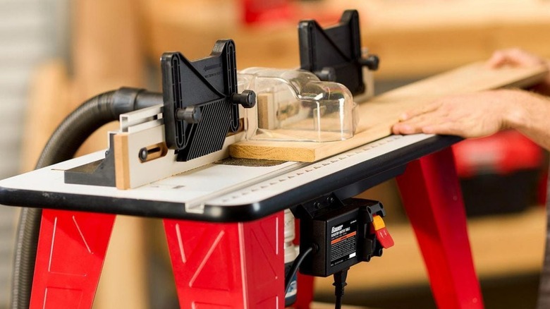 Person using Bauer Benchtop Routing Table