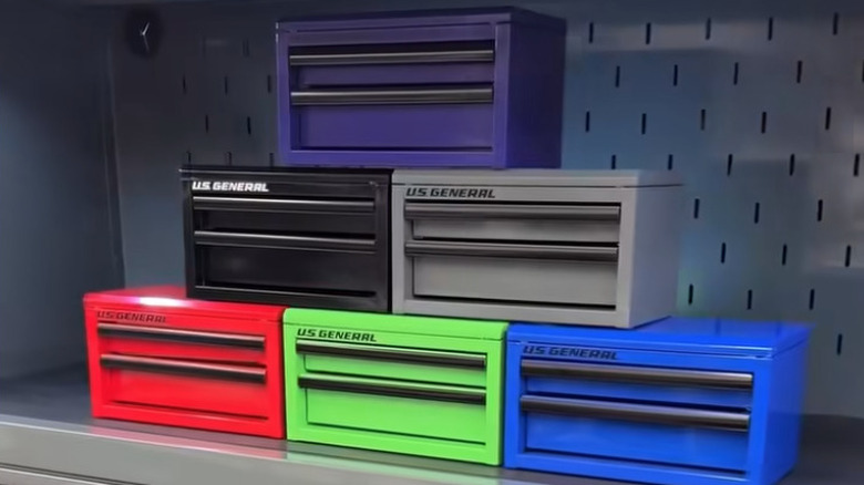 Mini tool boxes in purple, black, gray, red, green, and blue