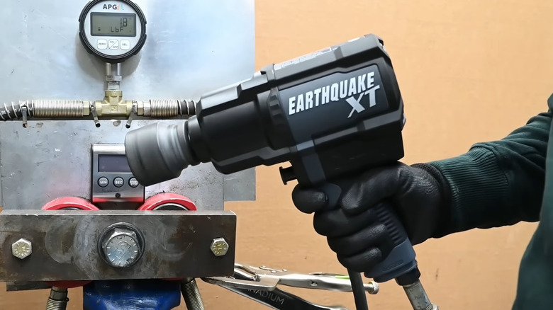 Earthquake impact wrench being tested