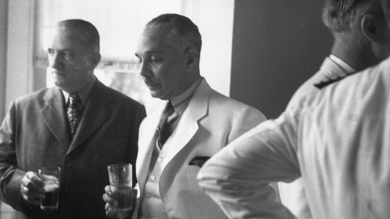 Rafael Trujillo holding a drink