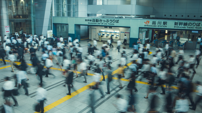 commuters in a Japanese subway station