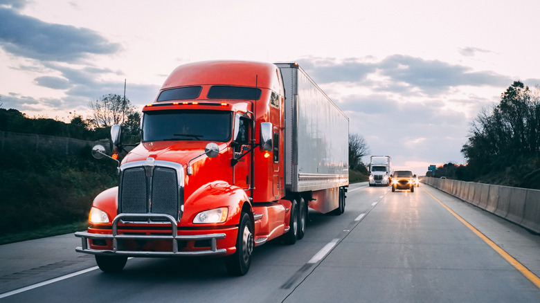 red semi-truck on the road