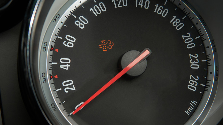 An early 2010s Opel speedometer with a DPF light on