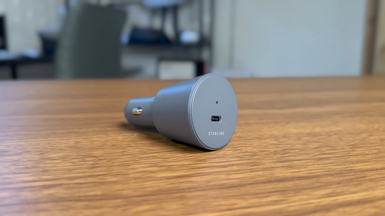 Starlink Mini unconnected car adapter on table