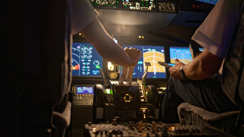 Close up of pilots' instruments in an aircraft's cockpit.