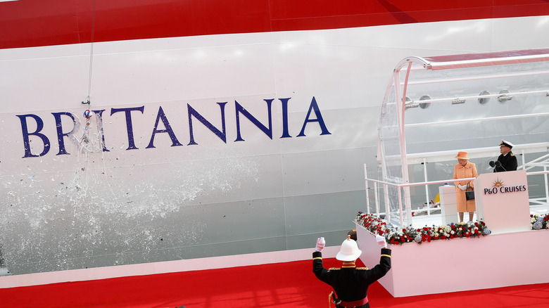 Queen Elizabeth II christens the P&O Cruises flagship Britannia with champagne in 2015