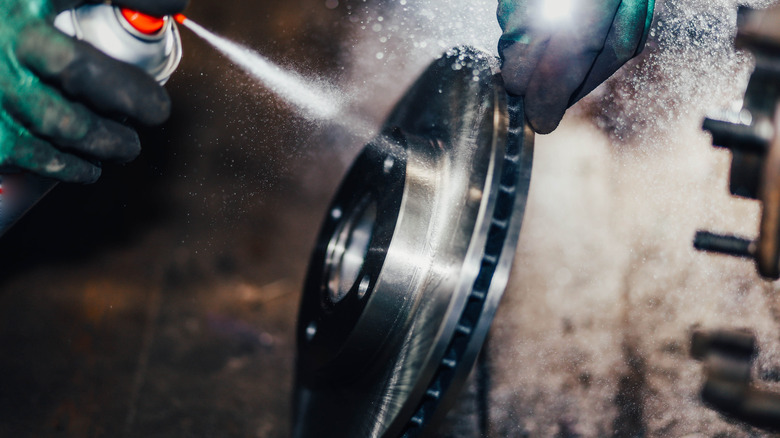 Cleaning spray on brake component