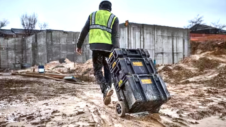 Person using Dewalt Rolling Tool Box