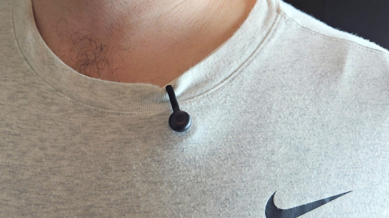 Hollyland Lark M2S Lav Mic attached to a white shirt.