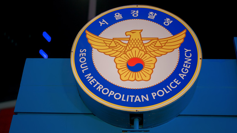 Seoul Metropolitan Police Agency emblem displaying law enforcement and justice in South Korea.