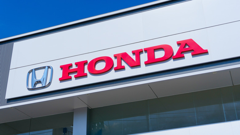 The current Honda Logo in silver and the words 