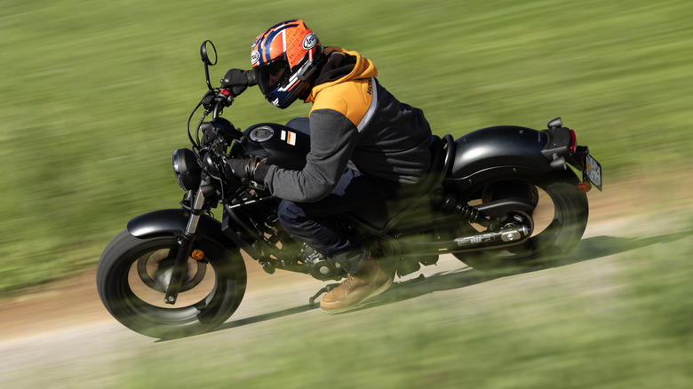 2026 Honda Rebel 300 E-Clutch Riding through a corner