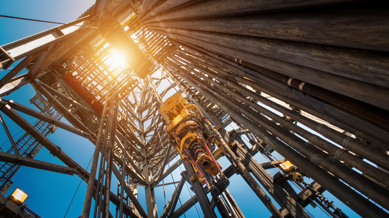 A bottom-up view of an oil rig.