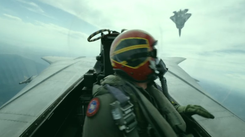 A pilot looks back at an American fighter in "Top Gun: Maverick"