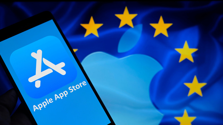 European Union flag with Apple logo and iPhone in foreground