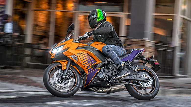 Orange Kawasaki Ninja 650 in the city