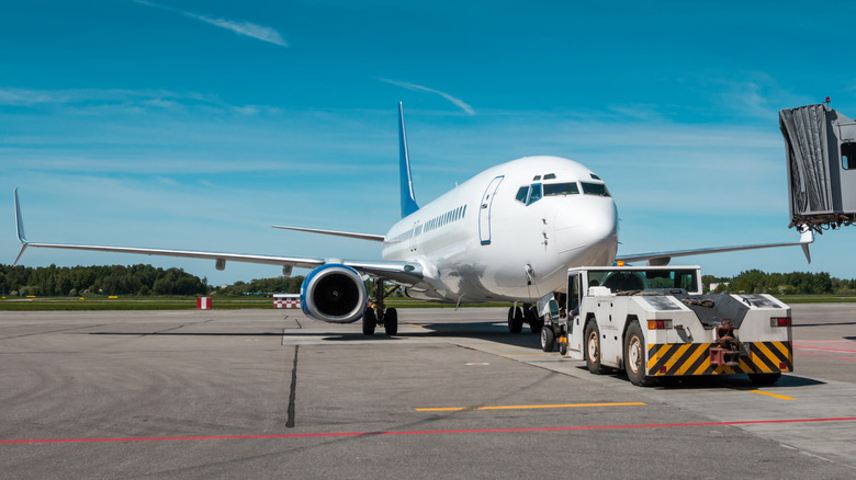 Aircraft tug pulling a Boeing 737
