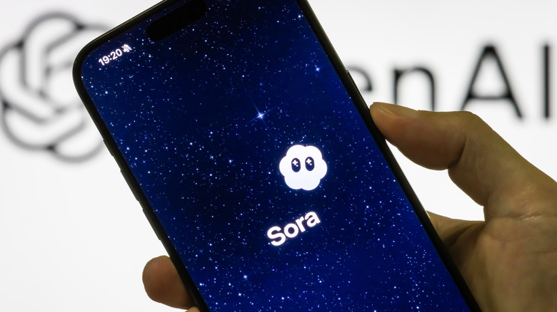 A person opens the OpenAI's new mobile social media application, Sora.