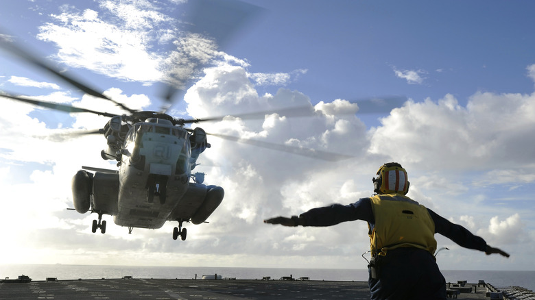 CH-53 Stallion helicopter landing on a flight deck