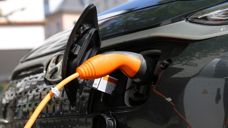 Electric car being charged