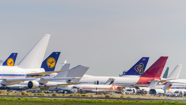 Retired commercial aircraft parked in an aircraft graveyard