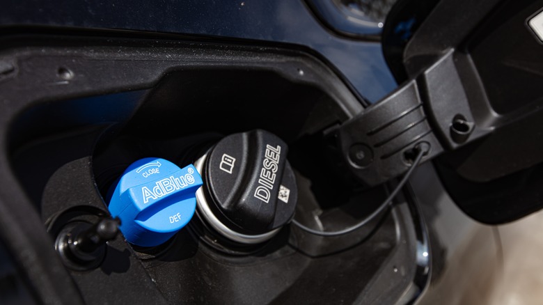 The outlets for DEF and diesel fuel are usually provided adjacent to each other