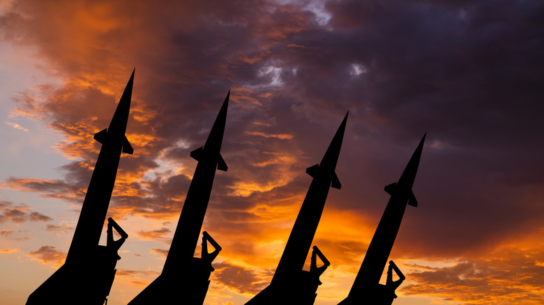 Missiles pointing at the sky.