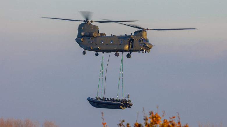 Chinook carrying a boat