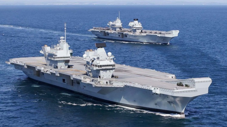 HMS Prince of Wales and HMS Queen Elizabeth pictured at sea for the first time on May 19, 2021.