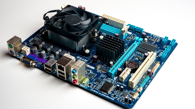 PC motherboard with a cluster of ports on the side