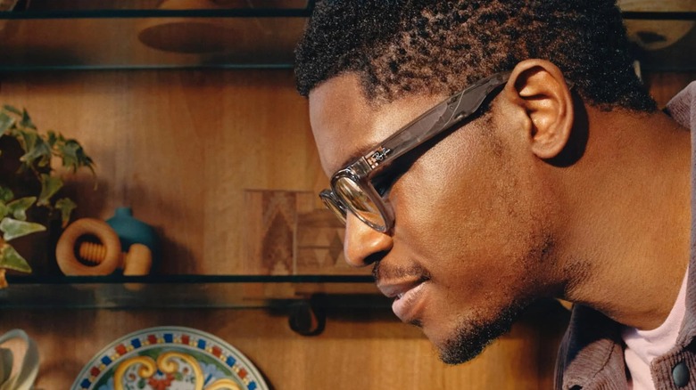 Man wearing Ray-Ban Meta glasses in sideview with Ray-Ban logo seen