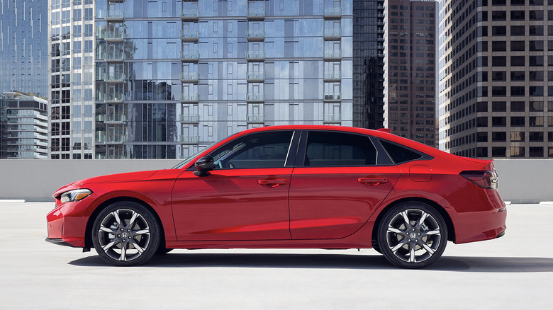 Side view of red 2025 Honda Civic Hybrid