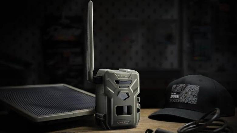 Spypoint Flex-Plus Cellular Trail Camera on a table