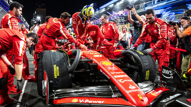 Ferrari F1 team working on F1 car during a pitstop