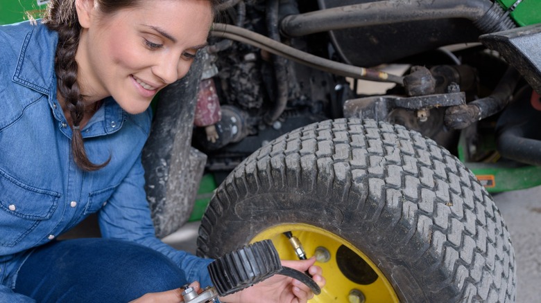 Maintaining riding mower tires.