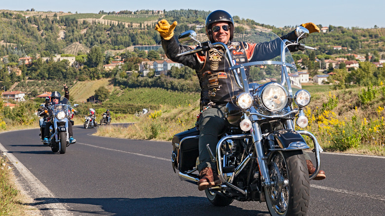 harley-davidson riders on country road
