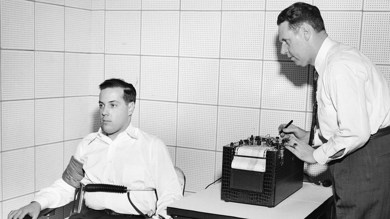John Larson demonstrating a polygraph system