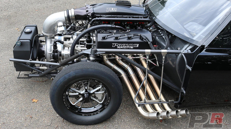 Proline Hemi-equipped Chevrolet Camaro with front-end removed and engine exposed, left-side close-up view