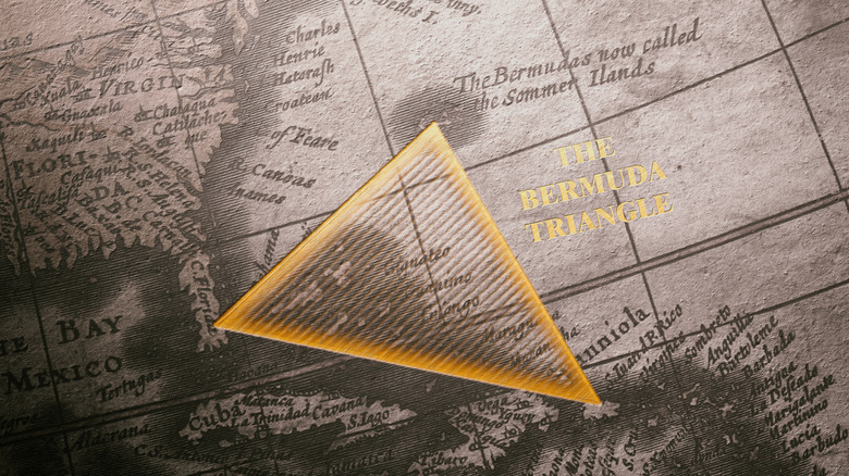 An aged-looking map with a yellow triangle superimposed alongside the legend 