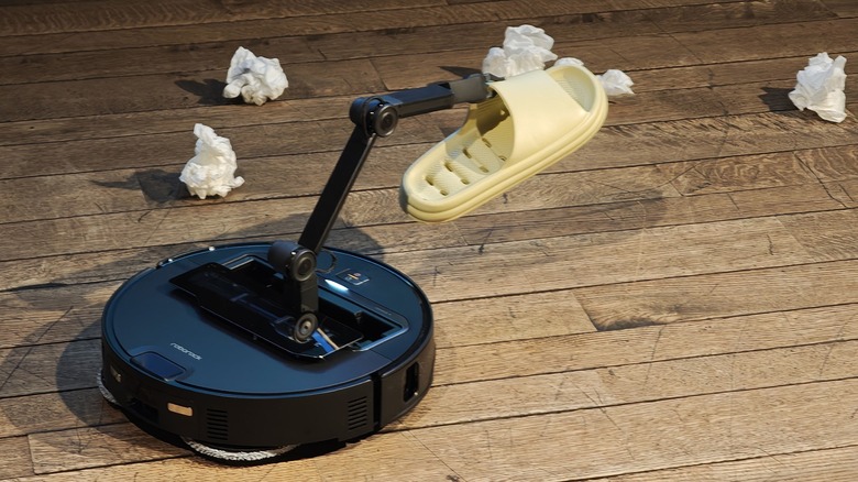 Roborock Saros Z70 holding a slipper