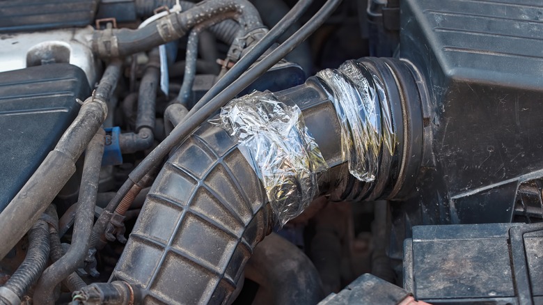 Air intake hose temporary repair with transparent duct tape