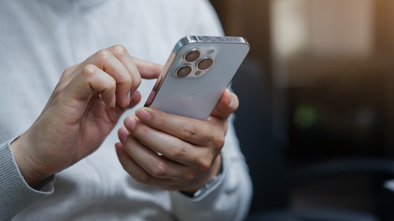 person holding iPhone