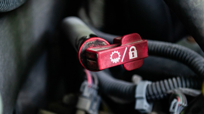 A red transmission fluid dipstick