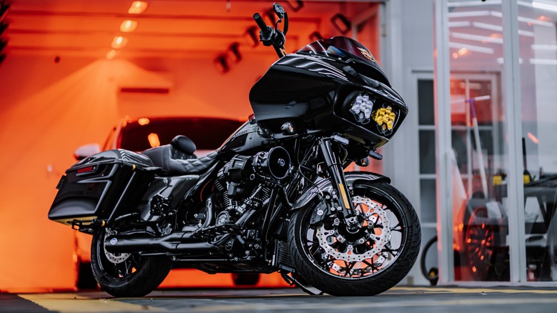A Harley-Davidson Road Glide parked outside a showroom