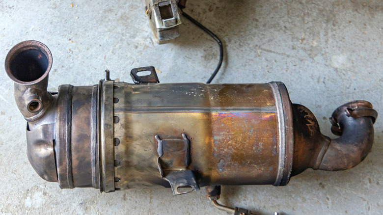 Diesel particulate filter placed on a garage floor