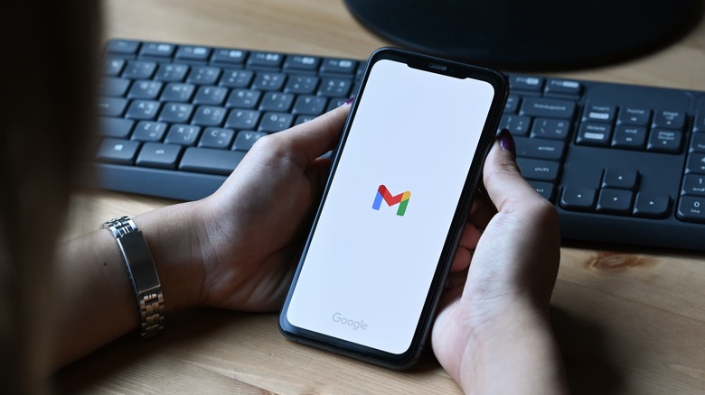 person using Gmail app