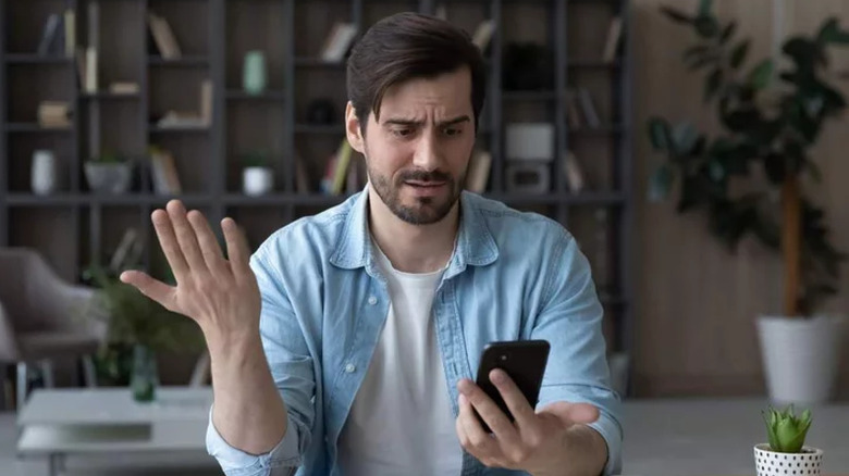 Man looking at phone